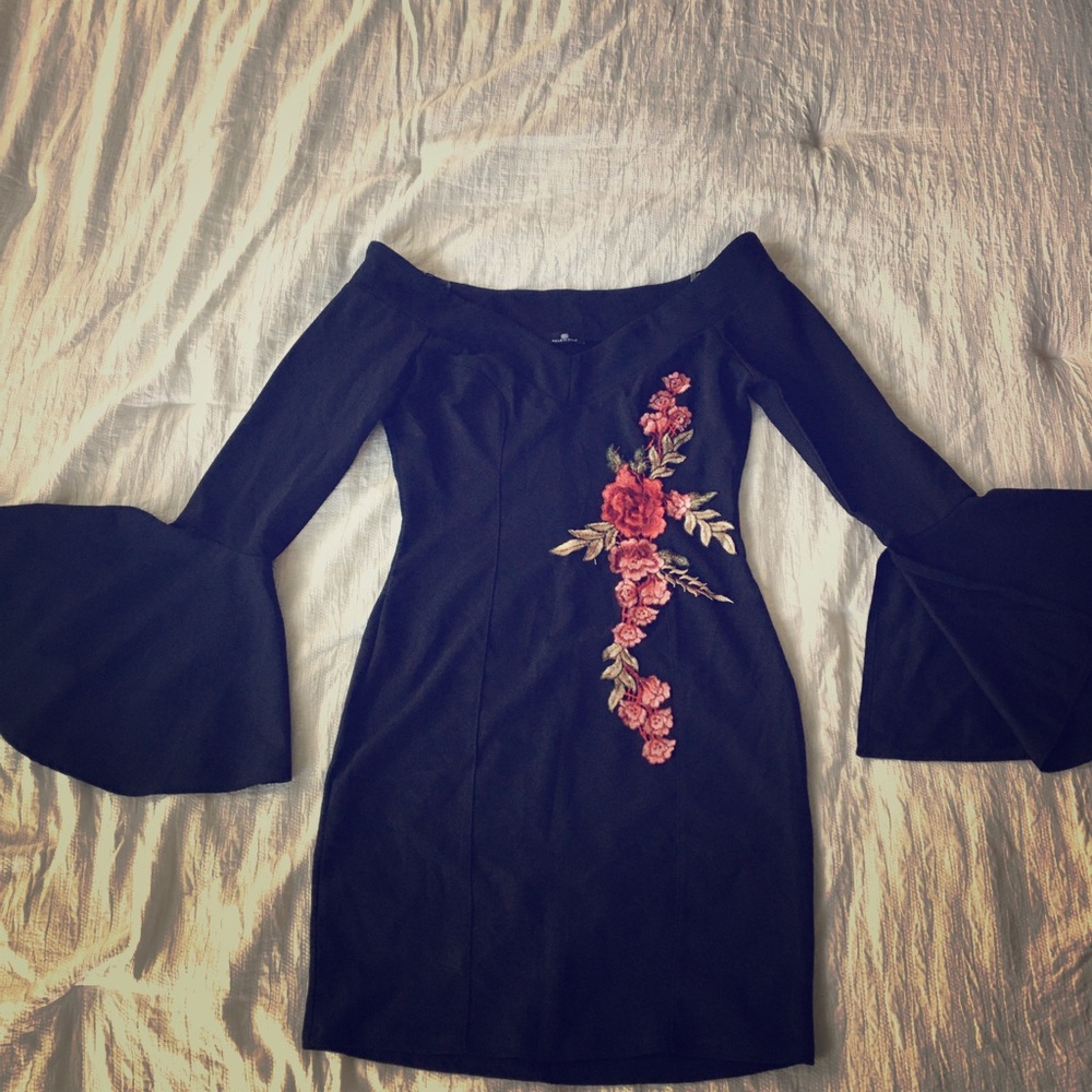 Black tight off the shoulder dress